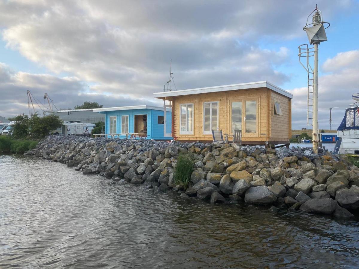Waterhuisjes Op De Pier Van Lauwersmeerplezier! Lauwersoog Eksteriør billede