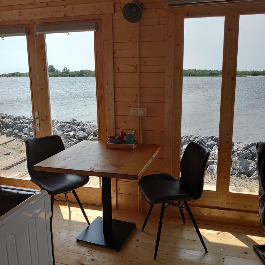 Waterhuisjes Op De Pier Van Lauwersmeerplezier! Lauwersoog Eksteriør billede