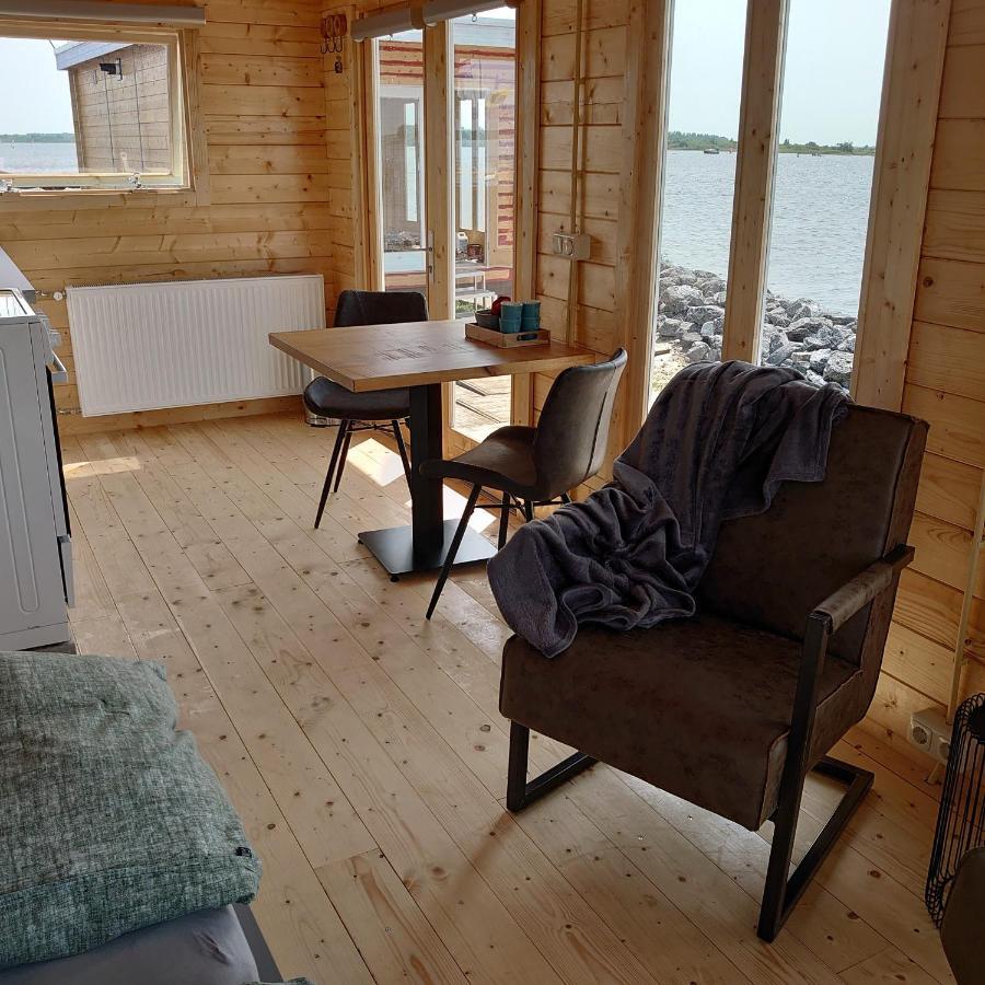 Waterhuisjes Op De Pier Van Lauwersmeerplezier! Lauwersoog Eksteriør billede